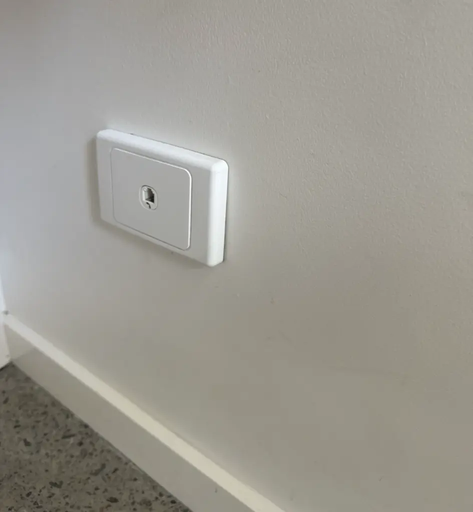 Flush ethernet data point installed on a wall